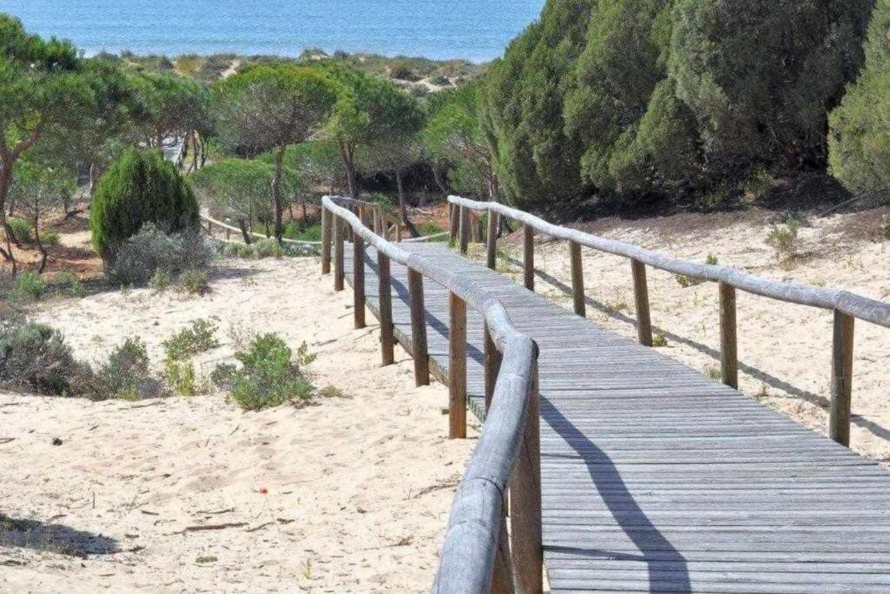 Apartamento junto a la playa 4p con piscina y parking Punta Umbria Bagian luar foto