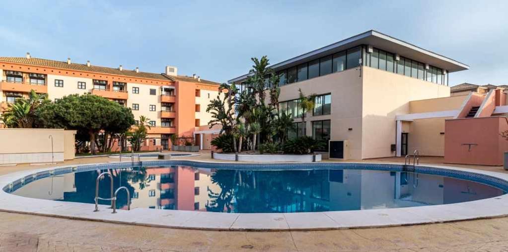 Apartamento junto a la playa 4p con piscina y parking Punta Umbria Bagian luar foto