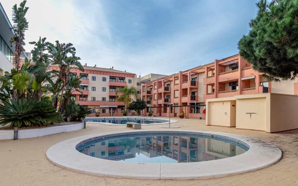 Apartamento junto a la playa 4p con piscina y parking Punta Umbria Bagian luar foto